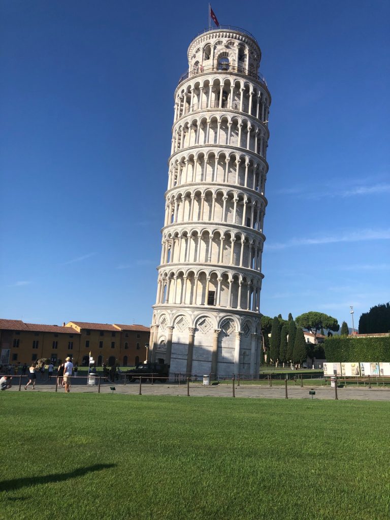 The famous leaning tower of Pisa in Pisa, Italy. The tower can be seen during our Italy road trip itinerary around Tuscany