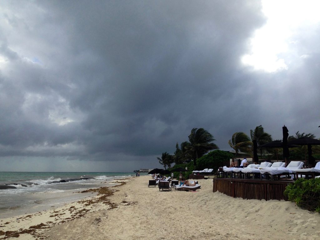 Stormy day, lots of clouds above playa del carmen near cancun in mexico. Cancun to Tulum by car, playa del carmen is one of the best places to see in yucatan peninsula.