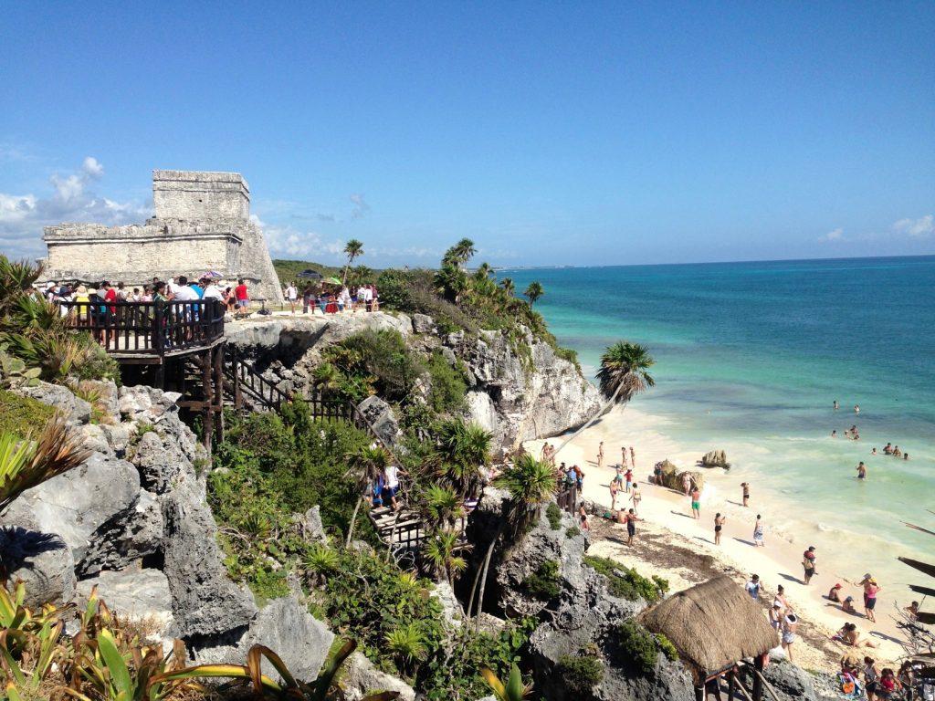 Tulum Archeological Site is a must-see on any Mexico road trip in the Yucatan Peninsula. The ruins are set in a picturesque setting, on a seaside cliff. After, visit the sandy beach below.