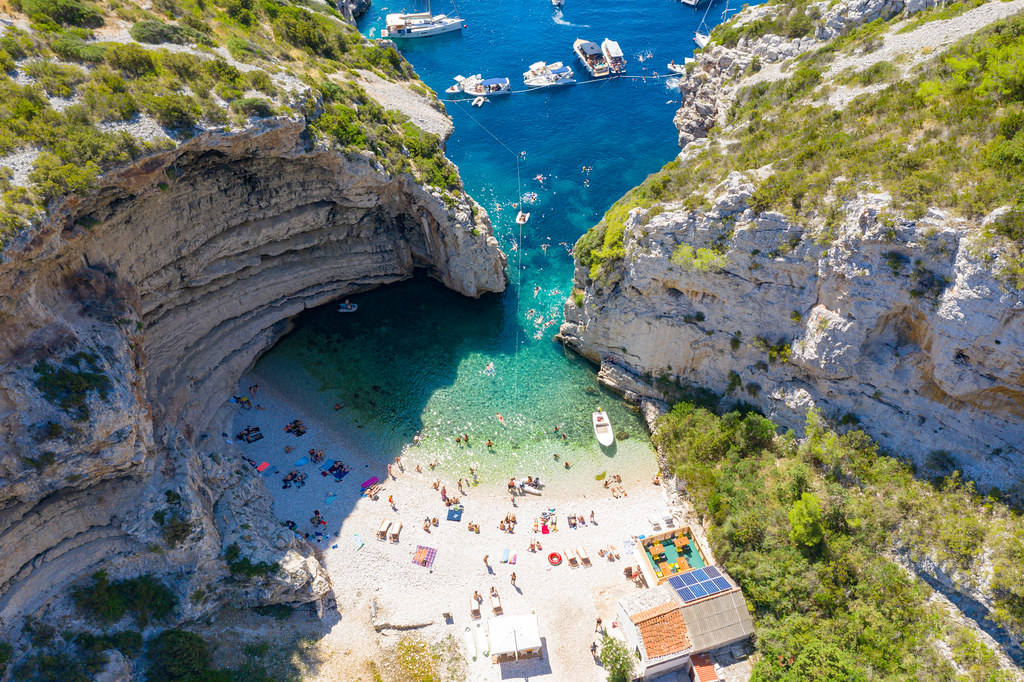 Stiniva Beach is a small pebble cove famous for its gorgeous natural setting- the beach is covered by tall cliffs from both sides. One of the nicest beaches in Croatia.