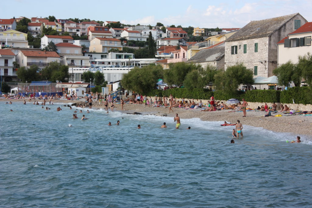 Mala Raduca Beach is a vibrant city beach, one of the nicest pebble beaches in Primosten, Croatia.