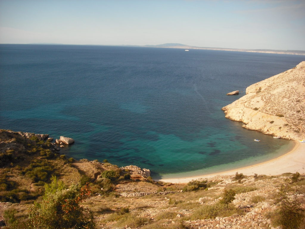 Oprna Bay is a wide pebble beach on the Krk Island in north Croatia.