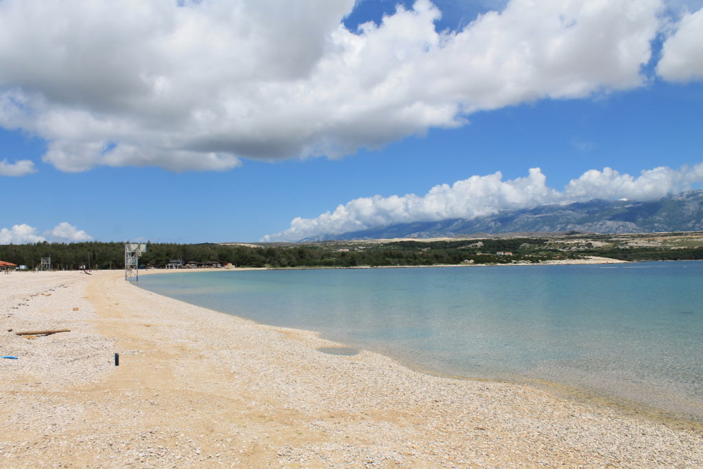 Zrce Beach is a gorgeous pebble beach, famous for its festivals and party scene, near Zadar in Croatia.