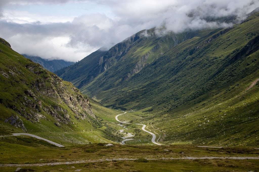 Mountain road in Austria. Learn about rental car insurance in Austria before driving a car in this country.